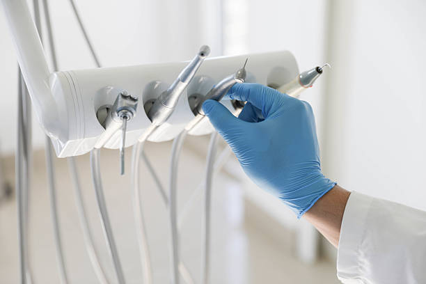 Professional Tooth Extraction technician working in Statesville, NC